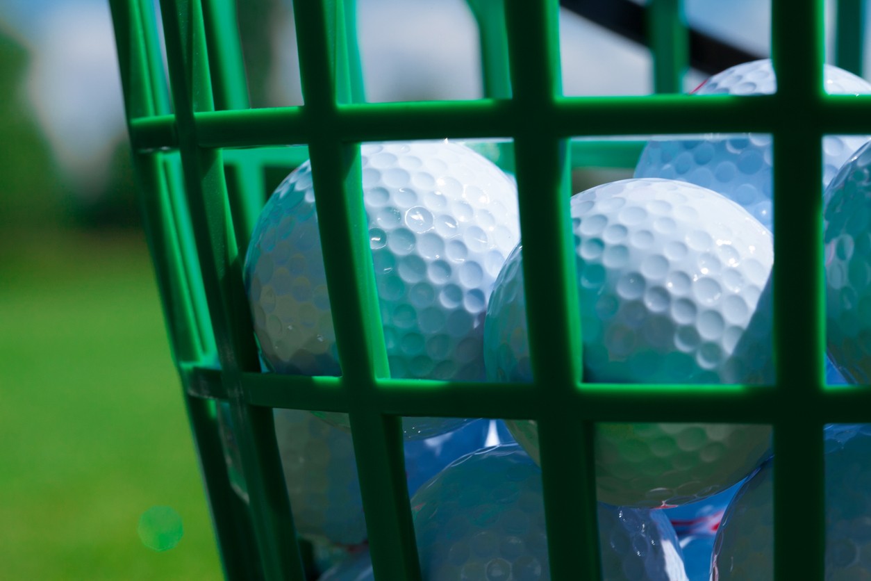 close-up-basket-of-golf-balls