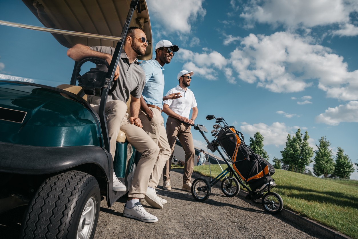 group-of-male-golfers-waiting-to-tee-off