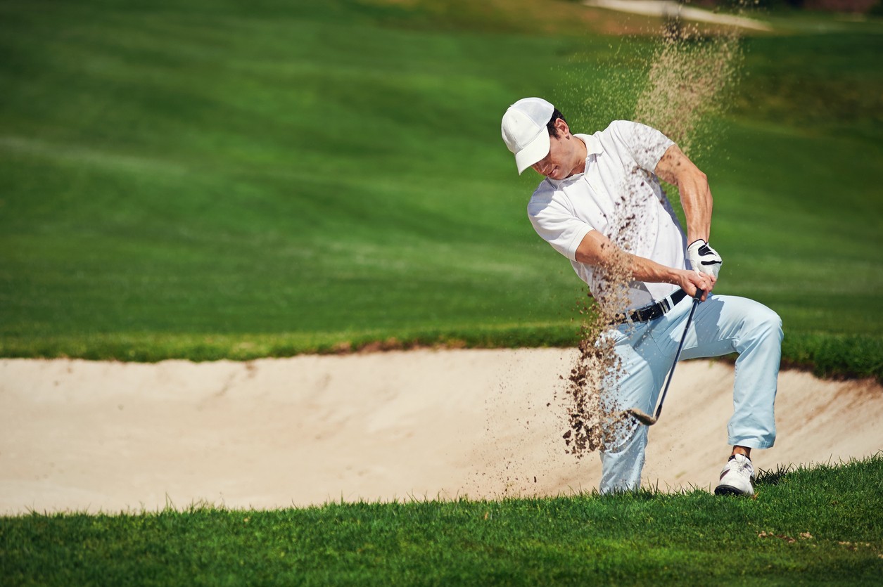 golfer-hitting-from-sand-bunker