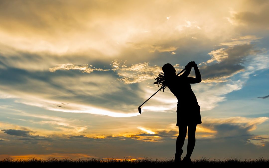 female-golfer-silhouette-at-sunset